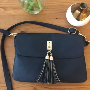 Navy bag with gold detail tassel